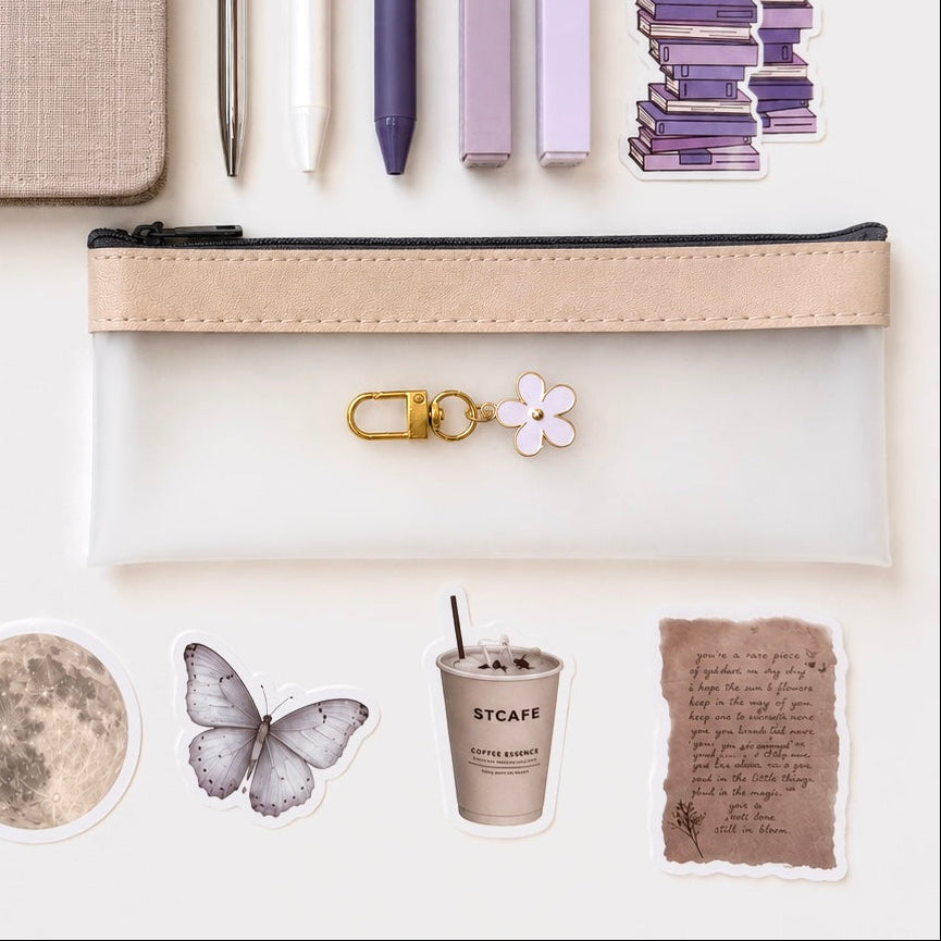 Transparent pencil pouch with pastel stationery accessories and neutral stickers