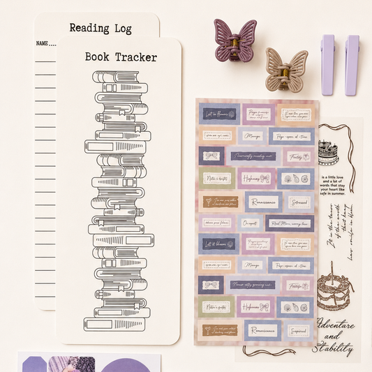 Collection of stationery items including a reading log, book tracker, stickers, and clips on a white background.