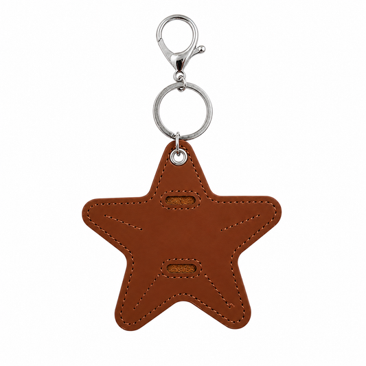 Brown star-shaped keychain with a silver clasp on a white background