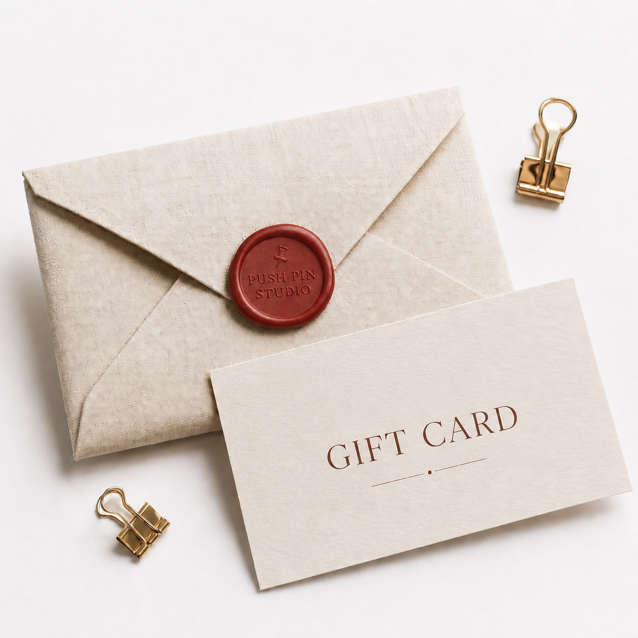 Beige envelope with red wax seal and 'Gift Card' card on a white background