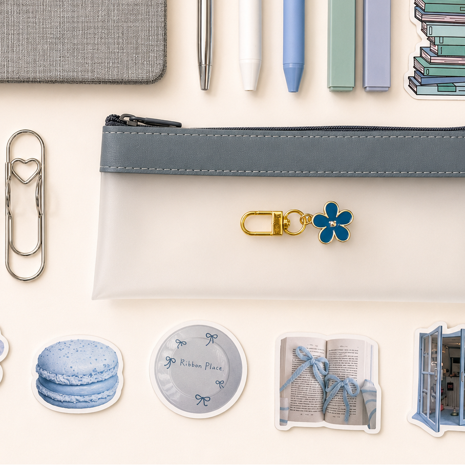 minimal blue stationery pouch with pastel journaling accessories, aesthetic planner supplies, and soft study essentials in calming sky blue tones