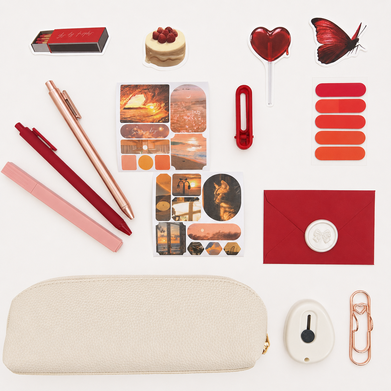 Red stationery set with notebook, pens, stickers, bookmark, washi tape, pencil case and reading tracker
